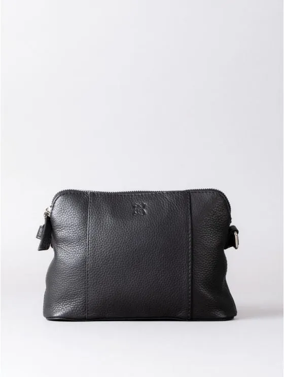 Alston Curved Leather Cross Body Bag in Black