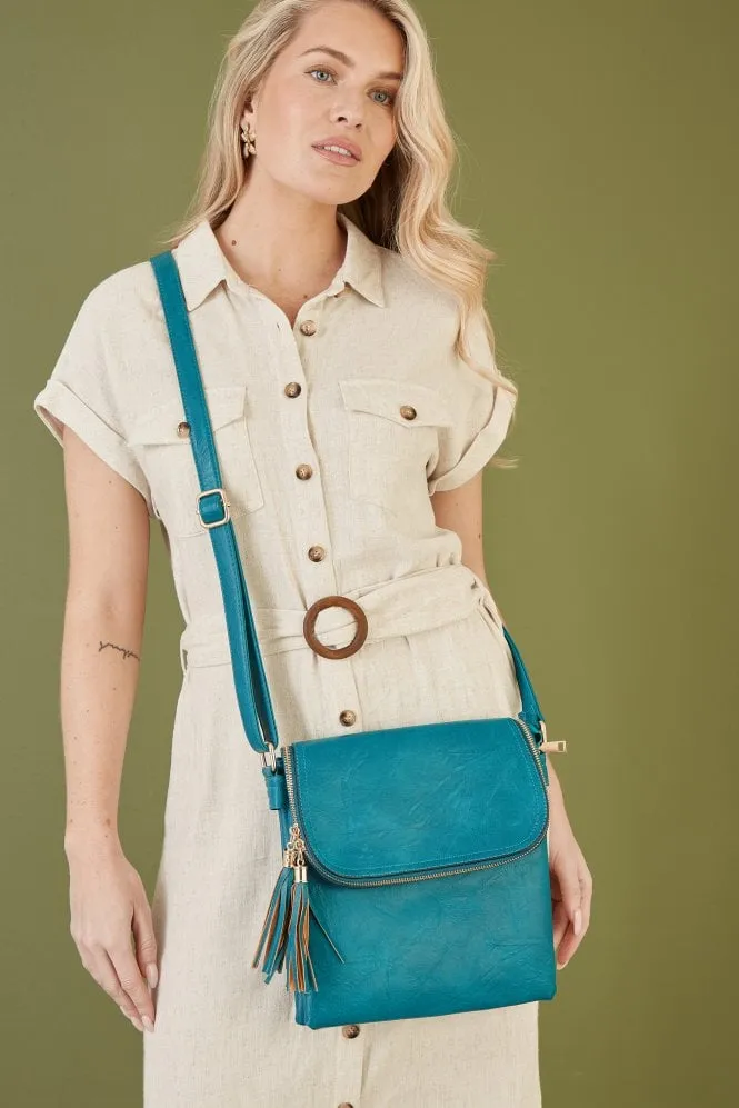 Yumi Teal Zip Tassel Cross Body Bag